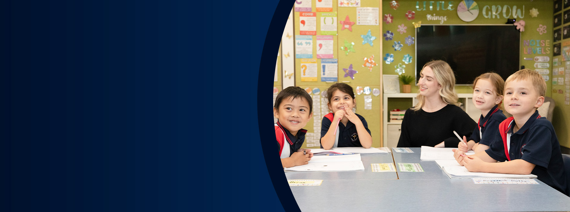 Teacher with her students in the classroom at St John XXIII College Stanhope Gardens