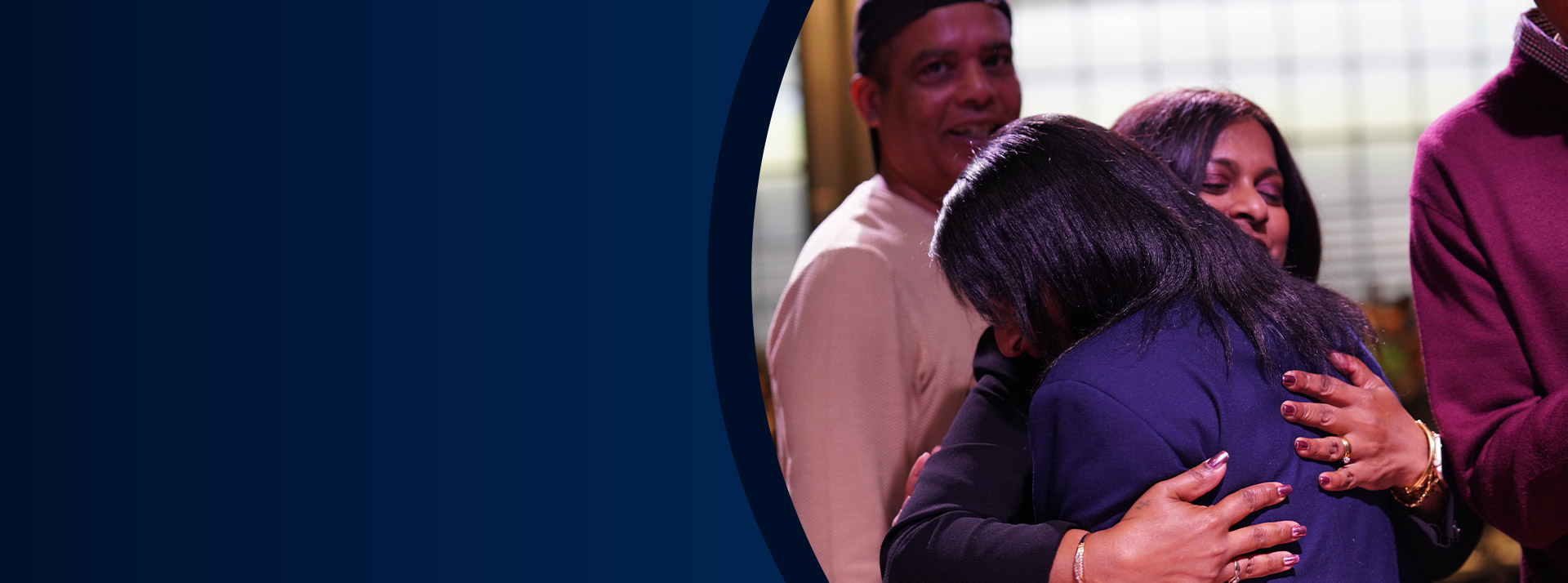 Student hugging her mother at a school event at St John XXIII College Stanhope Gardens