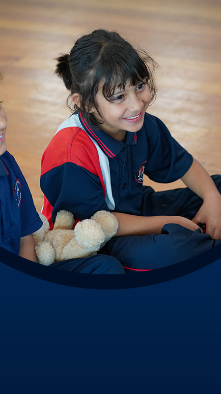 Students smiling in the classroom at St John XXIII College Stanhope Gardens