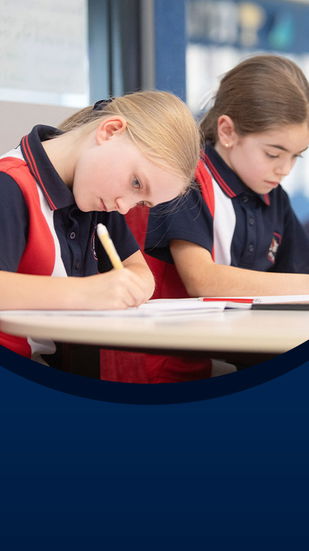 Students working in the classroom at St John XXIII College Stanhope Gardens