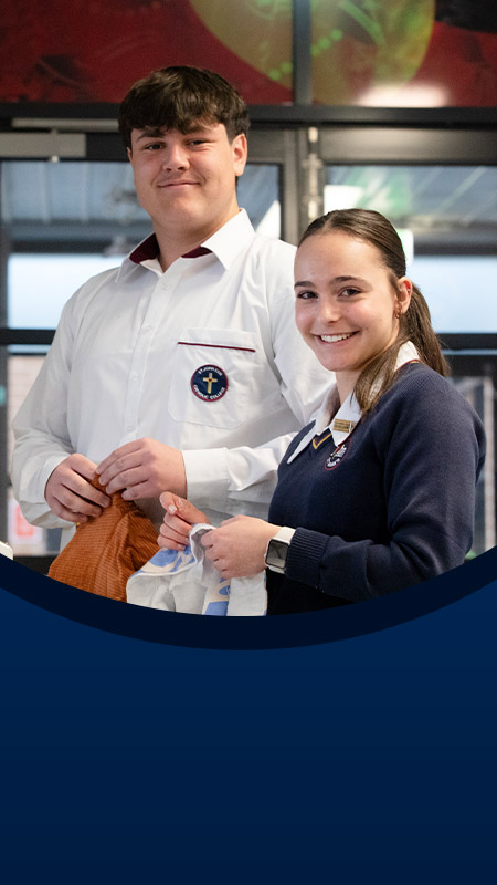 Students sewing together in the classroom at St John XXIII College Stanhope Gardens