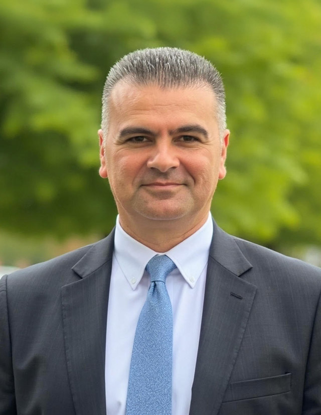 Principal of St John XXIII College Stanhope Gardens, Frank Chiment