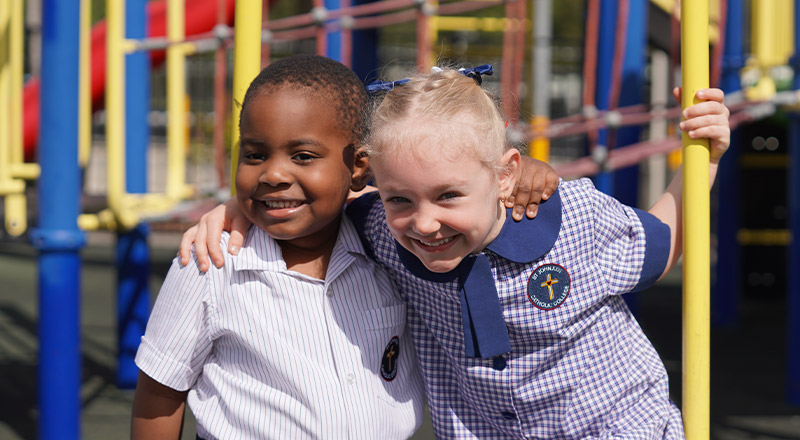 Students playing together in the playground at St John XXIII College Stanhope Gardens