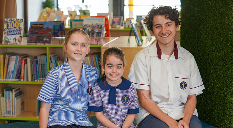 Students sitting together in the library at St John XXIII College Stanhope Gardens