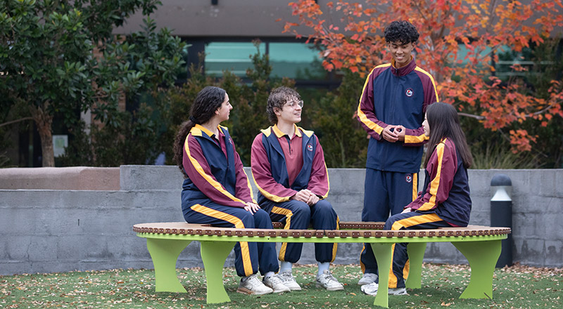 Students gathering together in the school grounds at St John XXIII College Stanhope Gardens