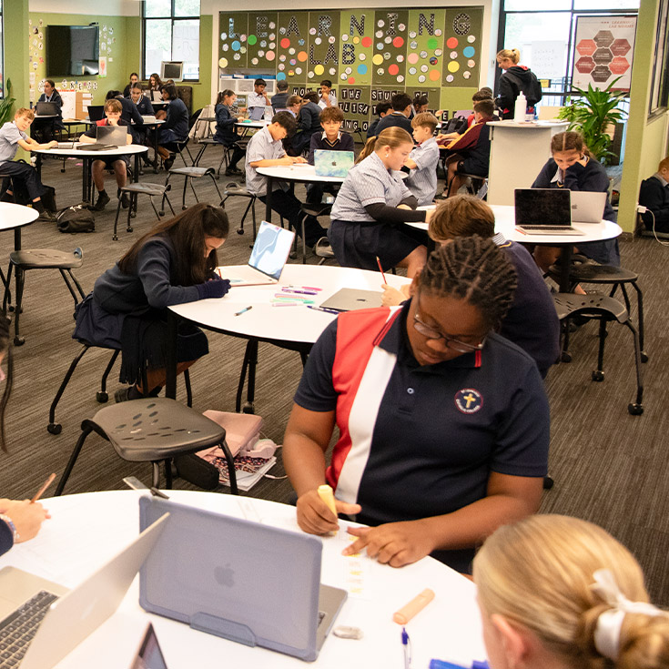 Senior students gathered together in a learning space at St John XXIII College Stanhope Gardens