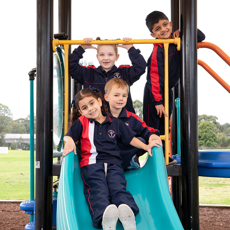 Students playing on the playground together at St John XXIII College Stanhope Gardens